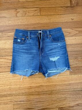 SIZE 25 Levi's Medium Blue Distressed Denim Shorts